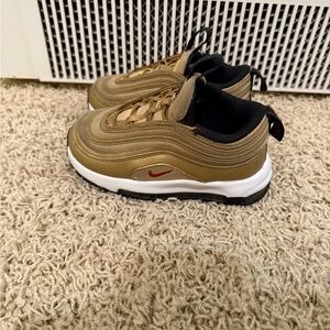 Nike Kids Gold and Black Sneakers with Red Swoosh